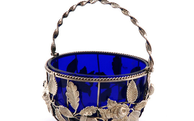 A Victorian swing-handled silver sugar basket