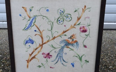 A Wooden firescreen with a Chinese silk embroidered panel set behind a glazed front 675 x 56 cm