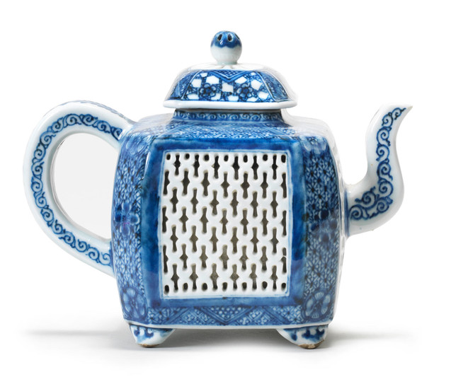 A blue and white reticulated teapot and cover