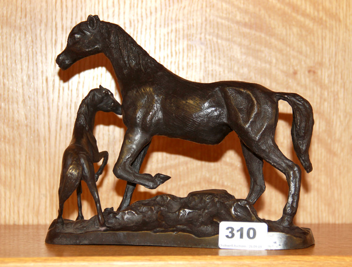 A bronze figure of a mare and foal, H. 19cm.
