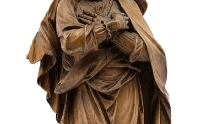 A carved limewood figure of the Virgin Mary