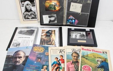 A collection of Doctor Who memorabilia including autographs and newspapers...