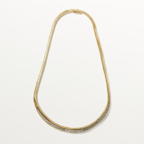 A diamond and fourteen karat gold necklace