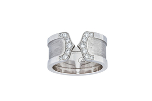 A diamond-set ‘Logo’ ring, by Cartier The brushed...