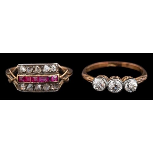 A diamond three stone ring,: set with three old cut diamonds...