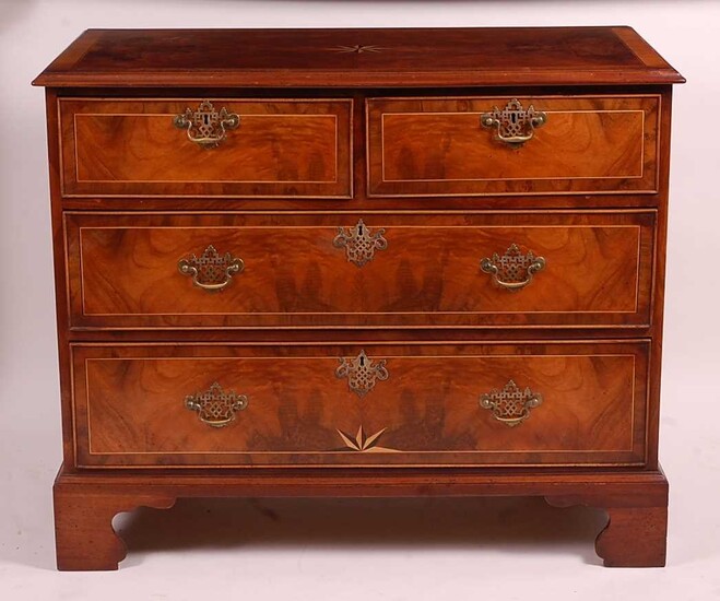 A figured walnut and crossbanded chest, in the early...