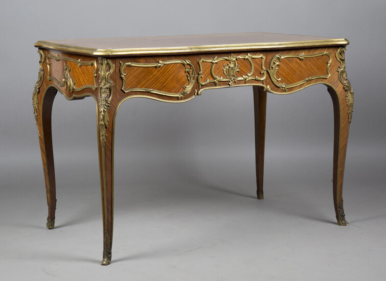 A fine late 19th century Louis XV style kingwood and ormolu mounted bureau plat, the parquetry top a