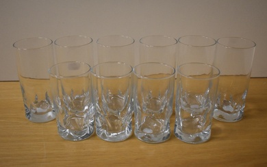 A group of ten mid-20th Century dimpled glass tumblers, the largest measure 15cm tall