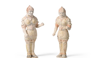 A large pair of Chinese painted pottery models of soldiers