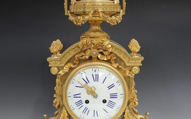 A late 19th century French ormolu cased mantel clock with eight day movement striking on a bell, the