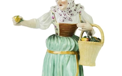 A late 19th century Meissen porcelain figure of an apple seller.