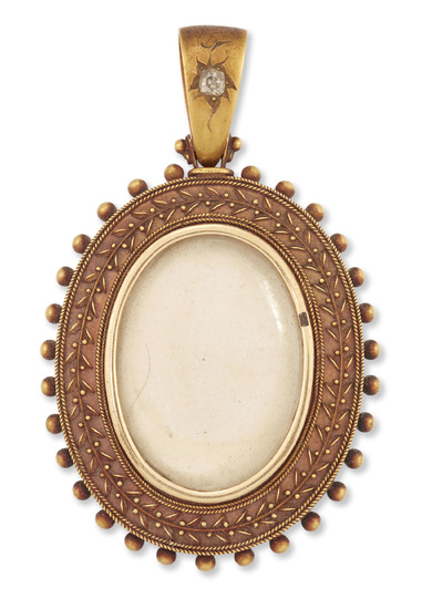 A late 19th century gold mounted pendant/locket, the central vacant...