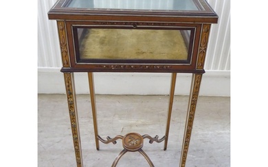A late 19th/early 20thC satinwood, hinged top display table,...