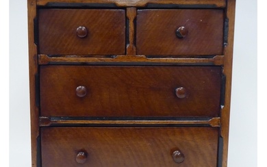 A late Victorian mahogany table top collector's chest, featu...