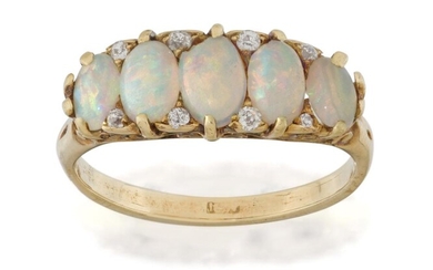 A late Victorian opal ring, the five oval opal cabochons to old cut diamond points in claw-set mount, the scroll carved gallery to a plain hoop, ring size approx. P