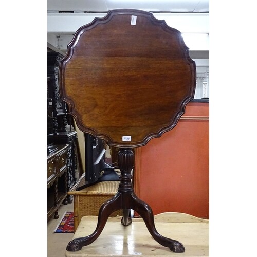 A mahogany Chippendale style tilt-top table, with pie crust ...