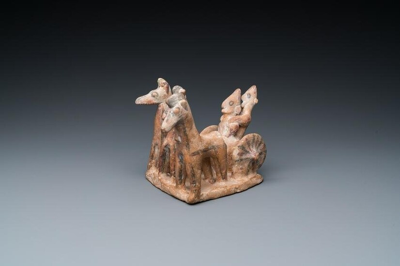 A painted terracotta horse carriage group, Cyprus, ca. 8th C. B.C.