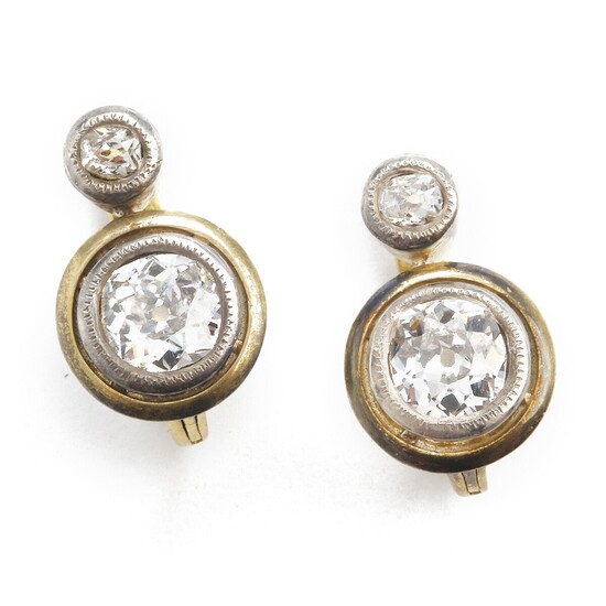 A pair of Belle Èpoque diamond ear pendants each set with old-cut diamonds weighing a total of app. 1.50 ct., mounted in platinum and 18k gold. Circa 1910. (2)