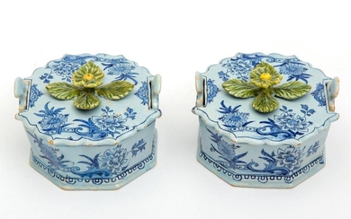 A pair of Delft pottery butter dishes