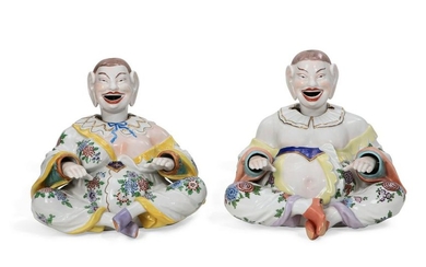A pair of Dresden porcelain pagoda figures