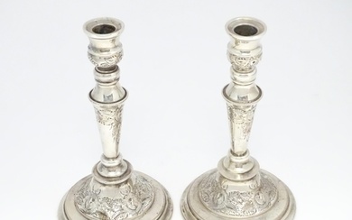 A pair of Elkington & Co. silver plate candlesticks. Approx....