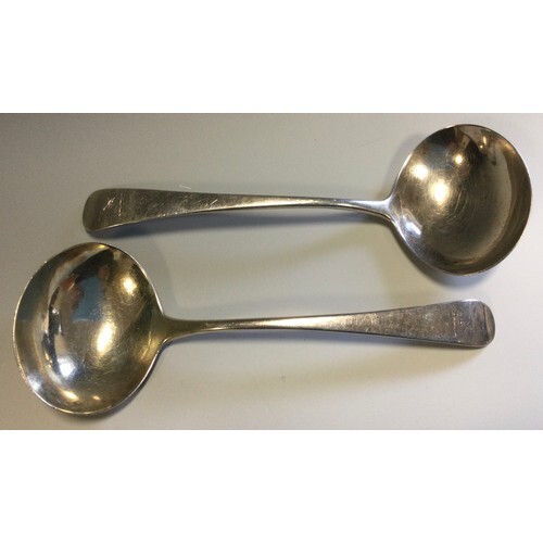A pair of George III Old English pattern silver sauce ladles...