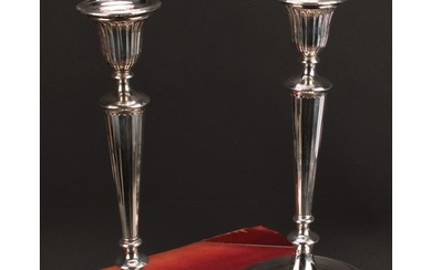 A pair of George III silver table candlesticks, detachable n...