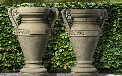 A pair of Italian carved Istrian stone urns