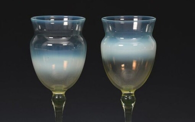 A pair of James Powell & Sons Whitefriars straw opal wine glasses designed by T G Jackson, with swollen bowls, unsigned, 13cm. high, (2) Literature Lesley Jackson Whitefriars Glass the Art of James Powell & Sons, Richard Dennis, page 98 plate 6 for...