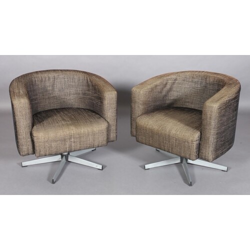 A pair of Milo Baughman style swivel tub chairs upholstered ...