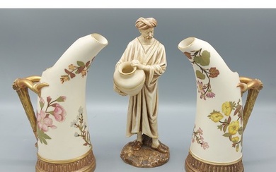 A pair of Royal Worcester blush ivory tusk vases decorated i...