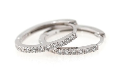 A pair of diamond ear pendants each set with numerous brilliant-cut diamonds...