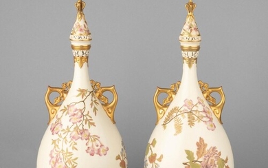 A pair of large Royal Worcester pyriform vases and covers, 19 in. (48.3 cm.) h.