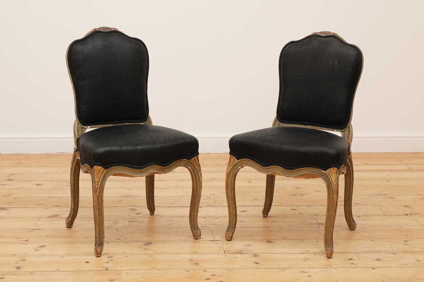 A pair of painted and parcel-gilt side chairs