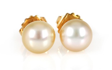 A pair of pearl ear studs each set with a South Sea...