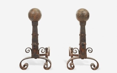 A pair of wrought iron andirons, Late 19th/early 20th