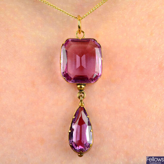 A pink topaz drop pendant.