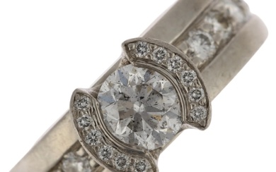 A platinum 0.73ct solitaire diamond ring, maker AFJ, London ...