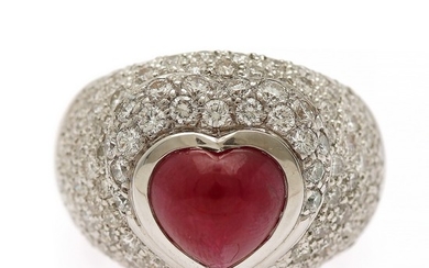 A ruby and diamond ring set with a hear-shaped ruby encircled by numerous diamonds, totalling app. 2.10 ct., mounted in 18k white gold. Size 55.