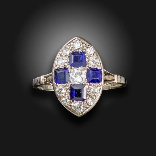 A sapphire and diamond lozenge ring, set with graduated old...