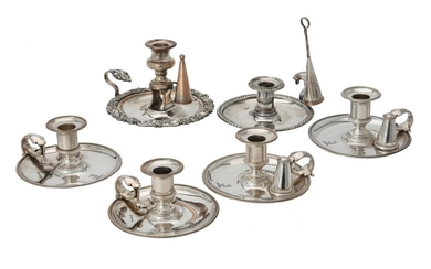 A set of four electro-plated circular chambersticks by Elkington & Co.