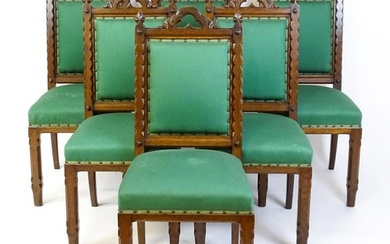 A set of six 19thC Gothic oak dining chairs , the upright su...