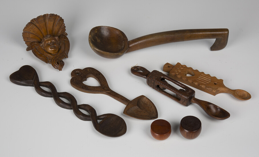 A small group of treen items, including a small 19th century carved pine amorino wall bracket, width