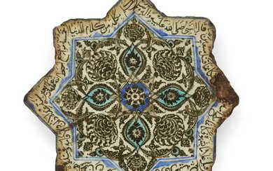 A star tile, Safavid Iran, circa 1600 Underglaze painted in black, turquoise...