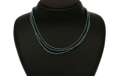 A three strand diamond necklace set with numerous roundel-cut blue diamonds with a clasp of 14k gold. L. 43.5 cm.