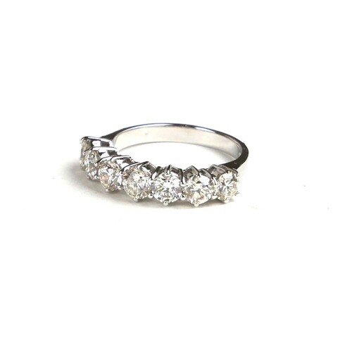 AN 18CT WHITE GOLD AND 1.82CT DIAMOND SEVEN STONE RING Havin...