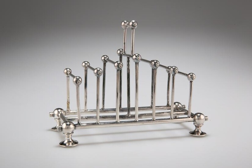 AN AESTHETIC SILVER-PLATED TOAST RACK, IN THE STYLE OF