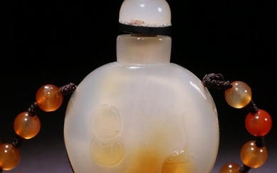 AN AGATE CARVED AUSPICIOUS PATTERN SNUFF BOTTLE