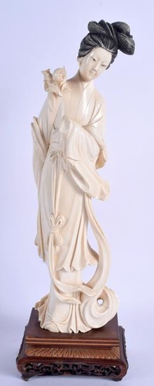 AN EARLY 20TH CENTURY JAPANESE IVORY OKIMONO, in the