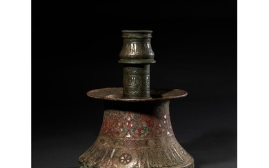 AN ILKHANID SILVER-INLAID BRONZE CANDLESTICK ILKHANID IRAN, ...